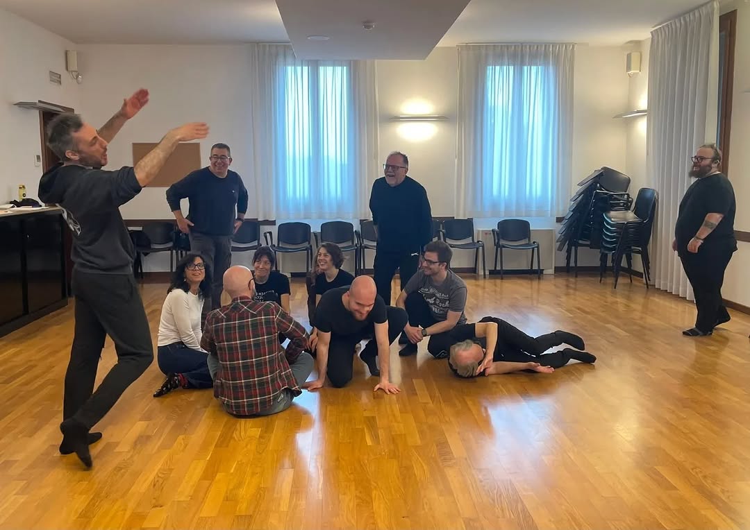 Ivano Conte teaching a workshop -- guiding a group in movement